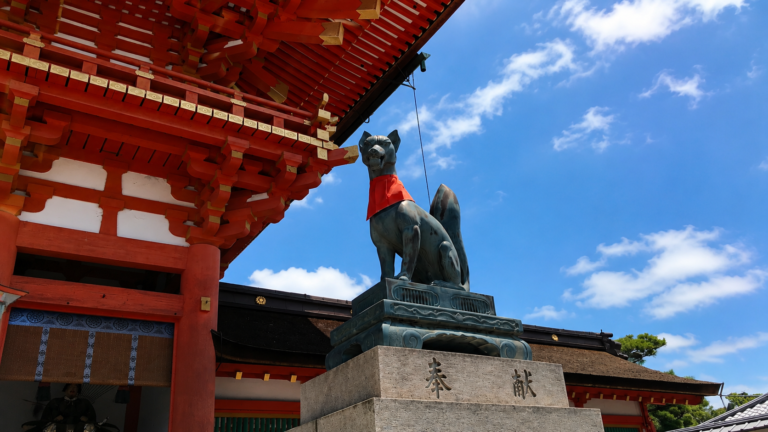 Fox statue at Fushimi Inari Taisha shrine in Kyoto, Japan