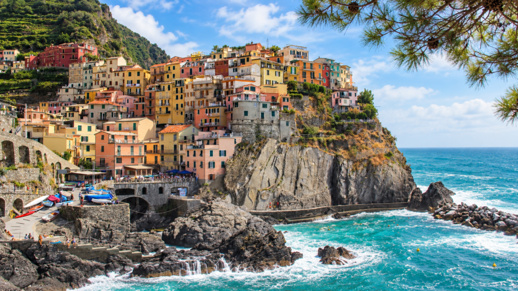 Coastal village in Liguria with colorful buildings and the sea